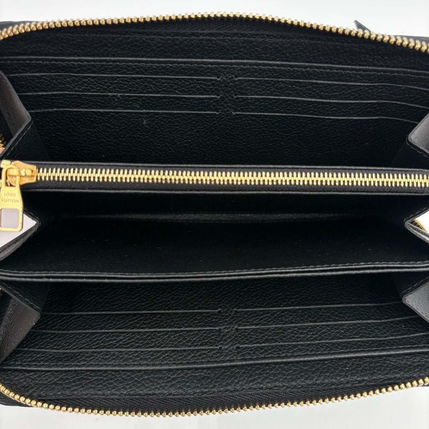Chipped Louis Vuitton Empreinte Leather Zippy Wallet