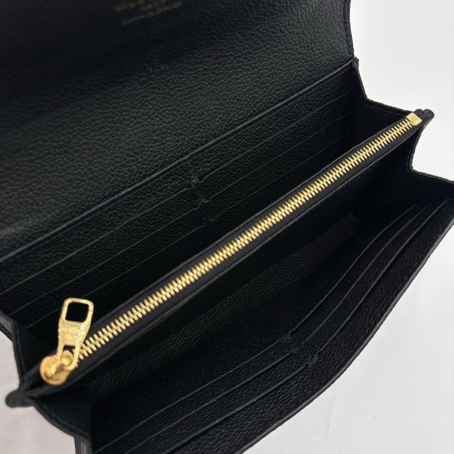 Chipped Louis Vuitton Sarah Wallet