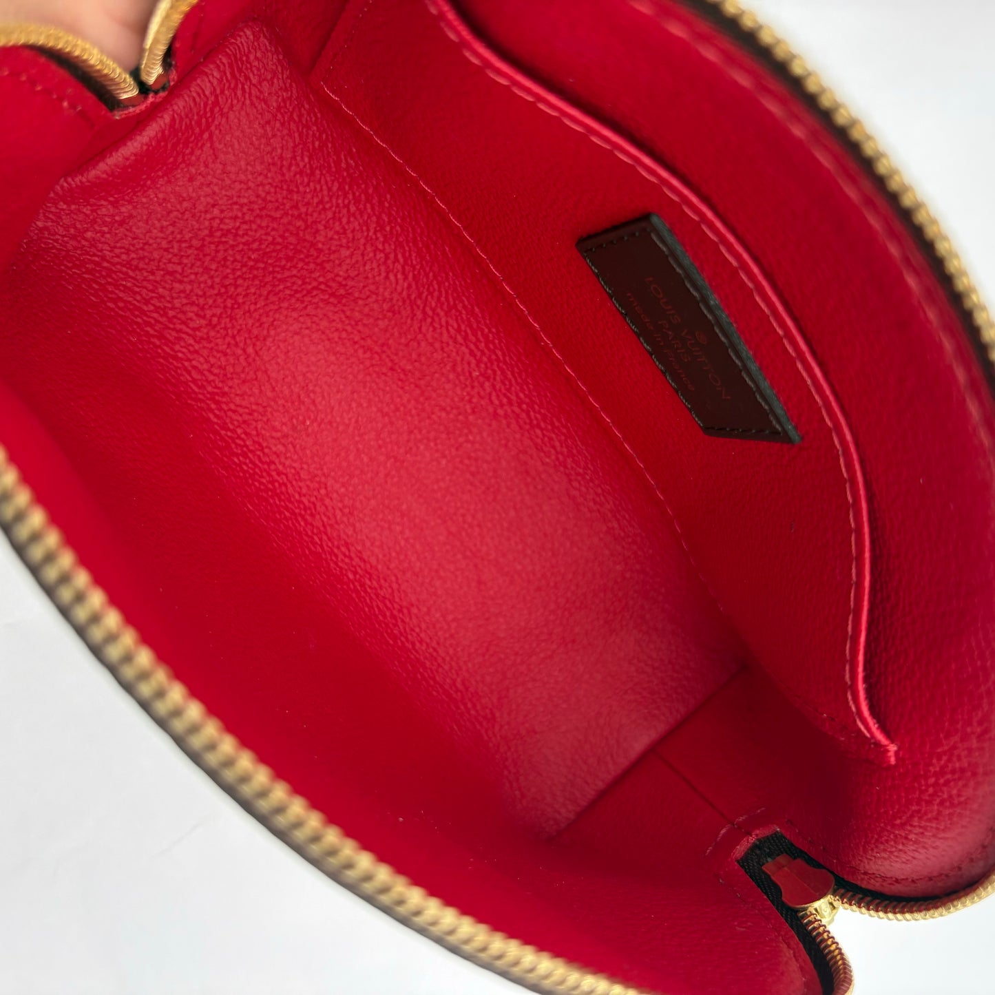 Chipped Louis Vuitton Cosmetic Pouch