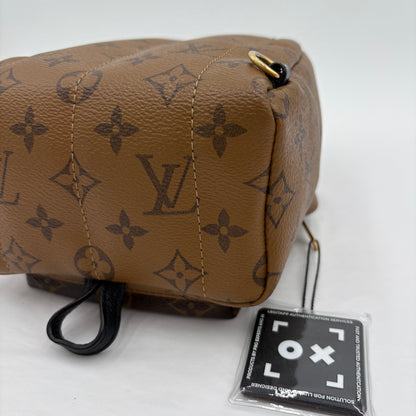 Chipped Louis Vuitton Reverse Monogram Palm Springs Backpack