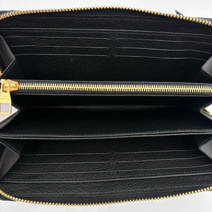 Chipped Louis Vuitton Empreinte Leather Zippy Wallet