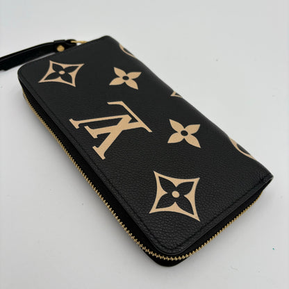 Chipped Louis Vuitton Giant Monogram Zippy Wallet