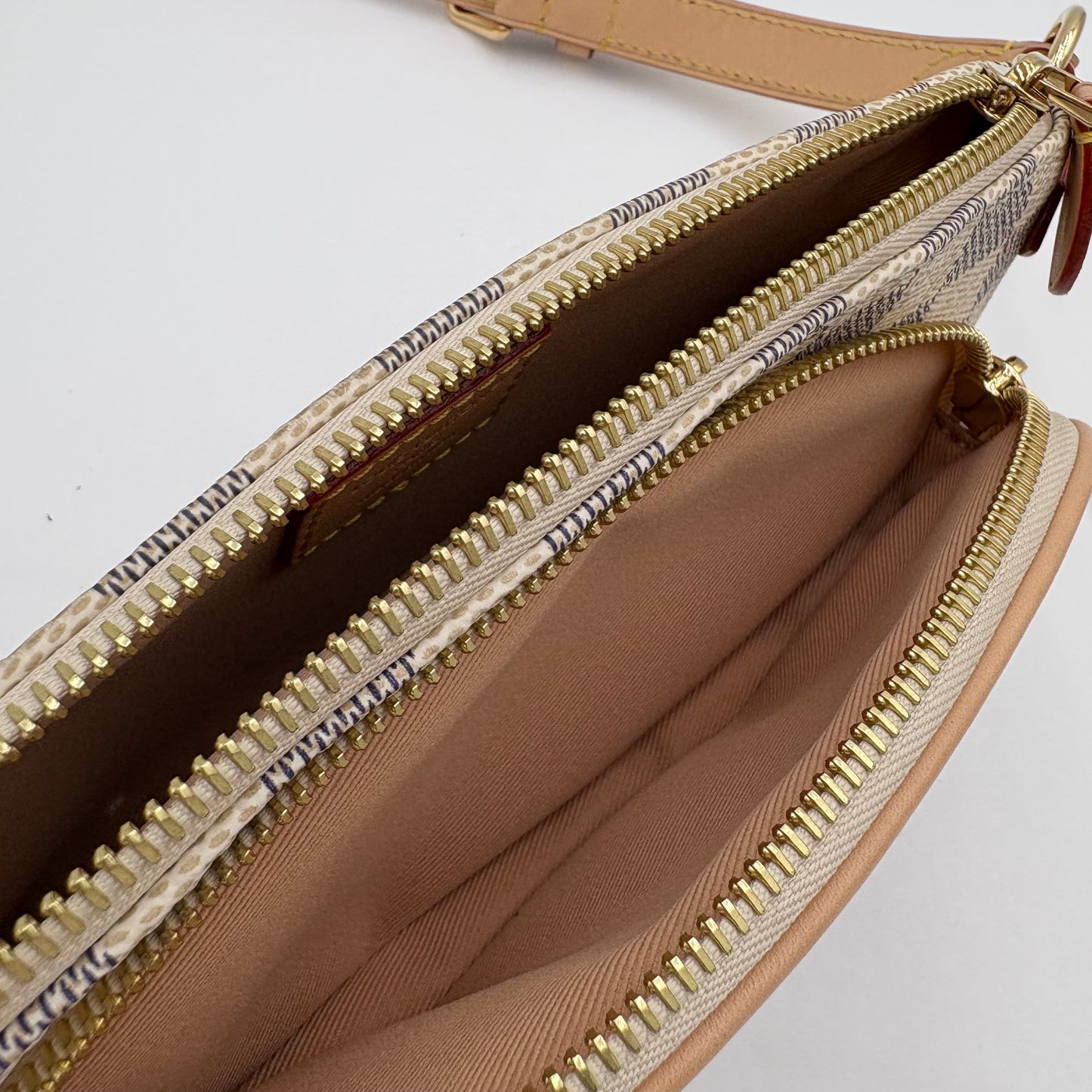 Chipped Louis Vuitton Keepit Belt Bag