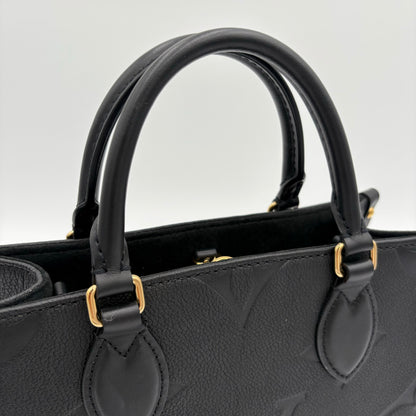 Chipped Louis Vuitton ONTheGo PM Giant Monogram