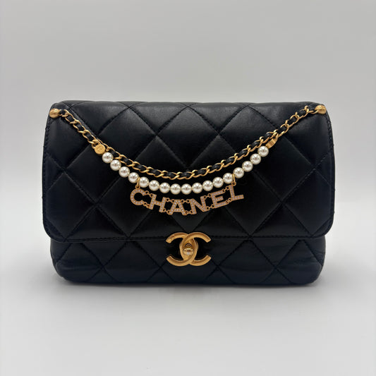 Chanel Quilted Pearl Logo Flap Bag