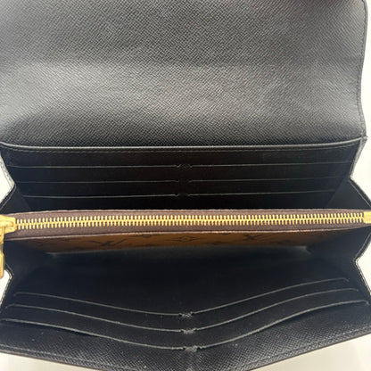 Chipped Louis Vuitton Sarah Wallet