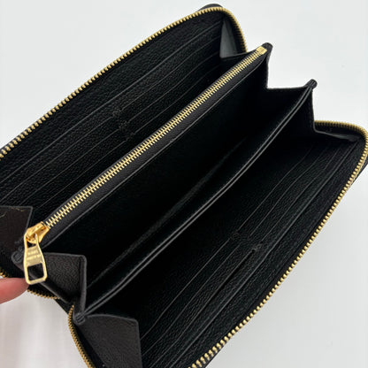 Chipped Louis Vuitton Giant Monogram Zippy Wallet