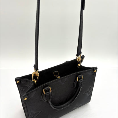 Chipped Louis Vuitton ONTheGo PM Giant Monogram