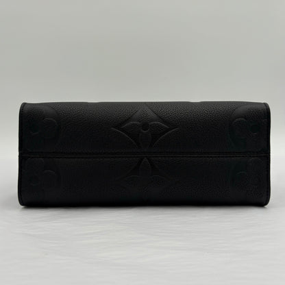 Chipped Louis Vuitton ONTheGo PM Giant Monogram