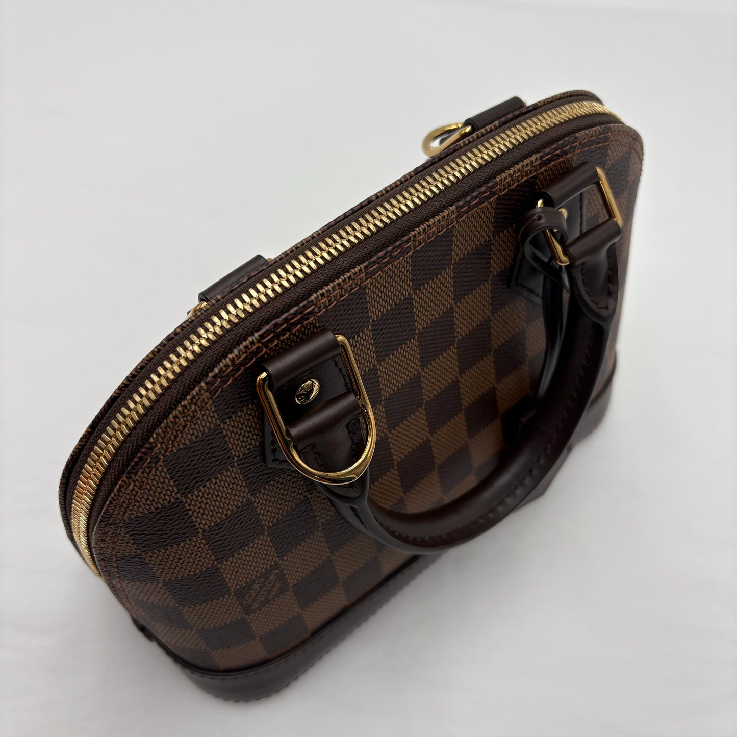 Chipped Louis Vuitton Alma BB Damier Ebene