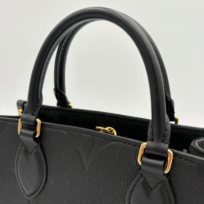 Chipped Louis Vuitton ONTheGo PM Giant Monogram