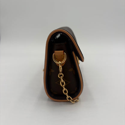 Chipped Louis Vuitton Pochette Camille Bag