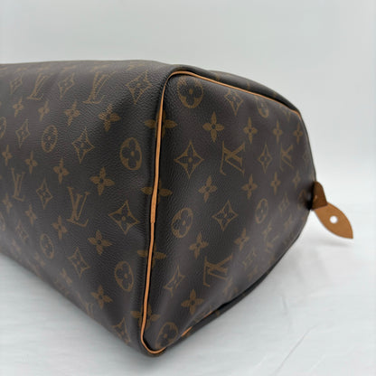 Chipped Louis Vuitton Monogram Speedy 35