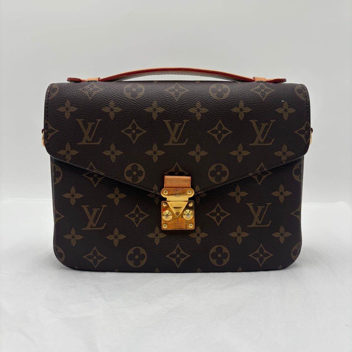 Chipped Louis Vuitton Pochette Metis Monogram