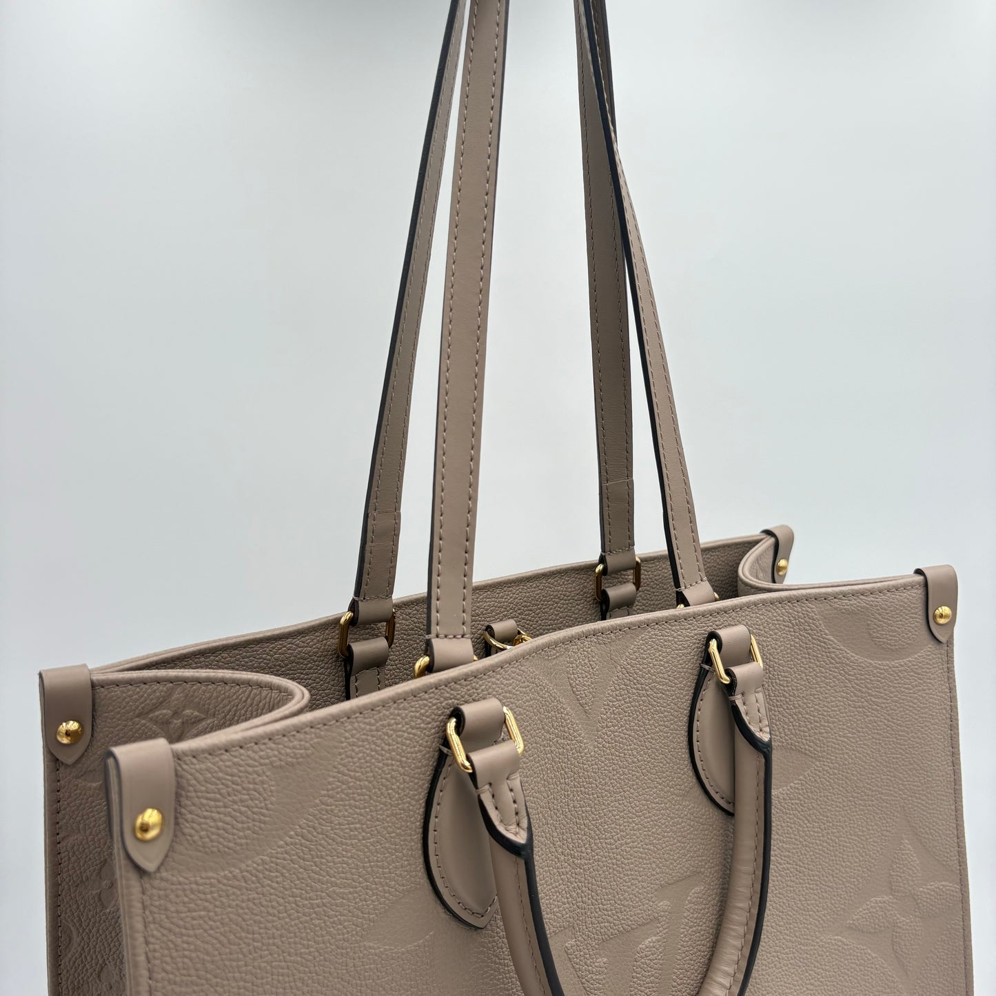 Chipped Louis Vuitton OnTheGo Giant Monogram Tote