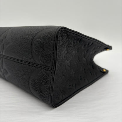 Chipped Louis Vuitton ONTheGo PM Giant Monogram