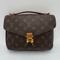 Chipped Louis Vuitton Metis Pochette Monogram